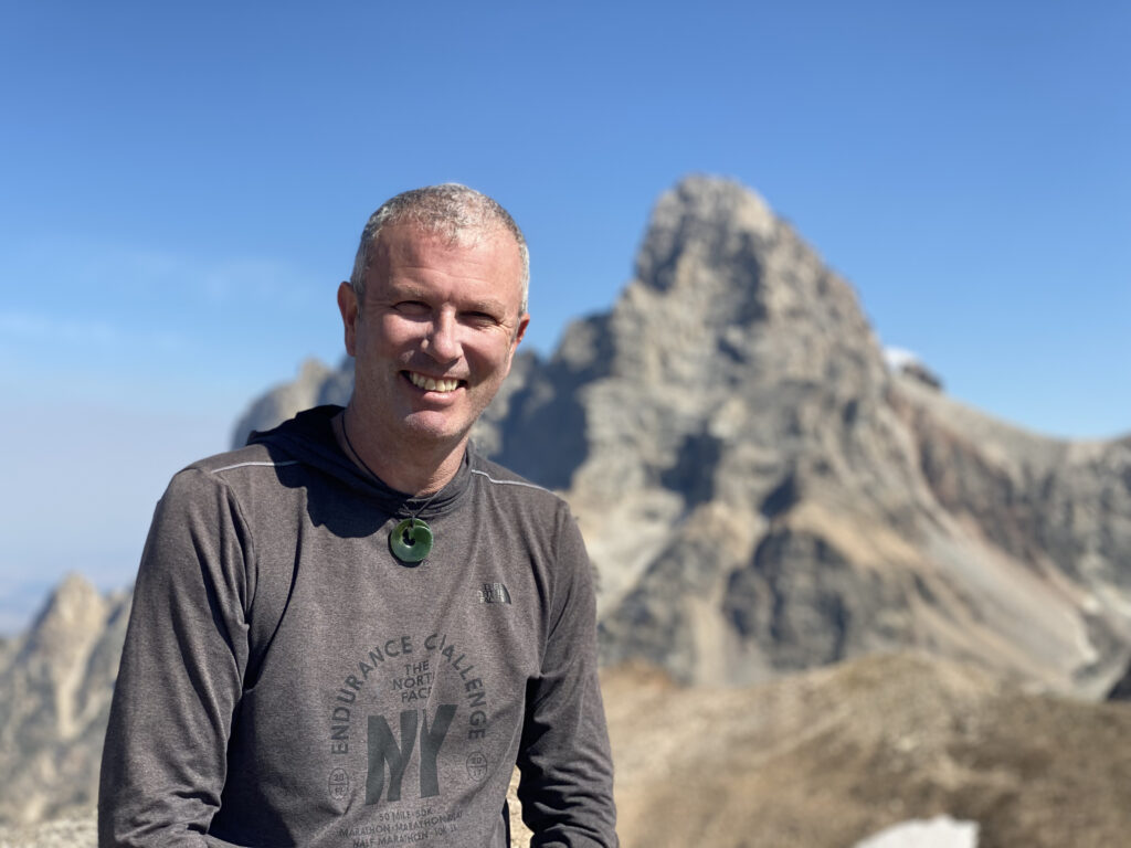 Liam Robb O'Hagan and the Grand Teton from Table Mountain.