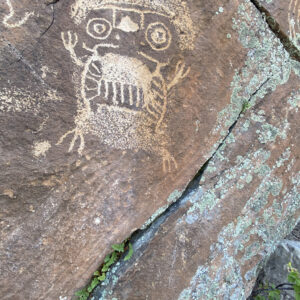 "Owl" Petroglyph carved into rock