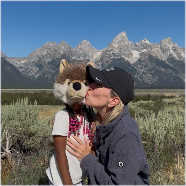 GrandTetonFamilyTourWolfKiss Guides of Jackson Hole A family watching wildlife on a Guided tour in Grand Teton